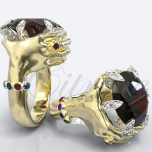 Sculptural gold hand ring holding a large black gemstone with diamond claws and colorful gem accents by Citrine Jewellery