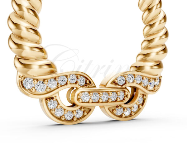 Close-up of diamond-studded clasp on gold rope pendant