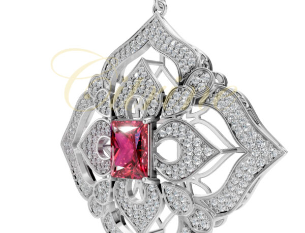 Close-up view of white gold pendant with red emerald-cut gemstone and intricate diamond filigree