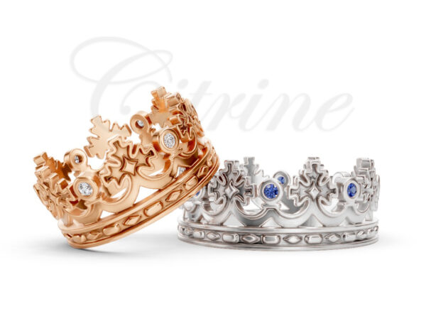 Crown-shaped rings in rose gold with white diamonds and white gold with blue sapphires