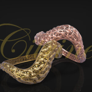 Gold filigree bracelets in yellow and rose finishes.