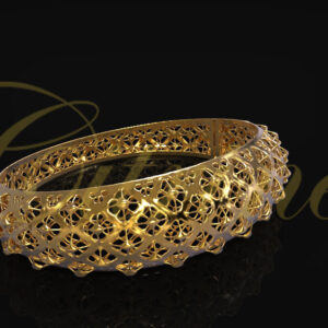 Gold bracelet with intricate lattice filigree openwork design.
