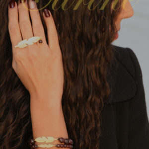 Handmade gold feather ring and bracelet set with beads by Citrine Jewellery