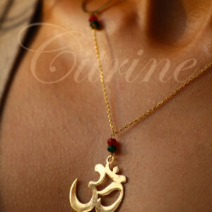 handmade gold pendant with red and green beads