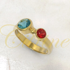 Gold ring with two vibrant contrasting gemstones.