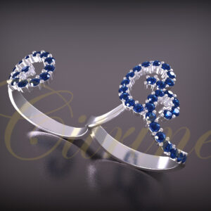 Silver double-finger ring with blue gemstone scroll design.