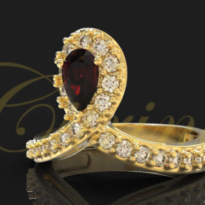 Yellow gold ribbon ring with pear garnet and pavé diamonds.
