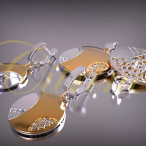 Modern bi-color disc jewelry set in gold and silver with pavé stones and filigree details.