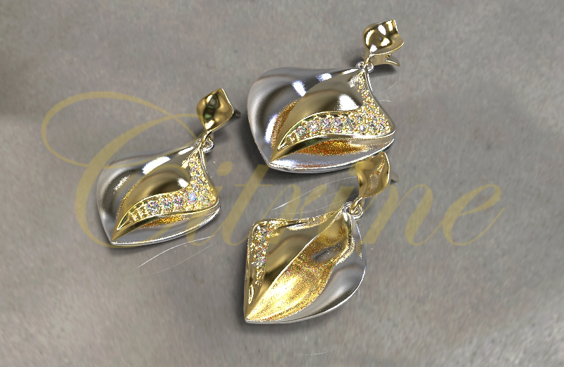 Two-tone leaf-inspired jewelry set in silver and gold with pavé-set stones.