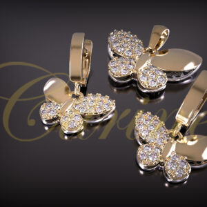 Butterfly jewelry set with pavé diamonds and polished gold finish.